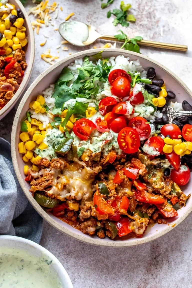 Delicious ground beef burrito bowls topped with fresh ingredients
