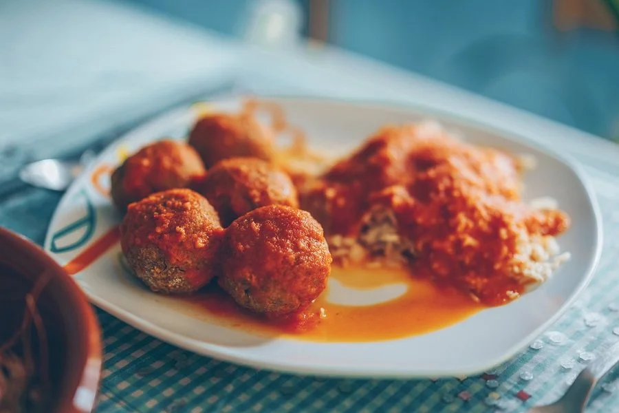 Delicious low carb meatballs made from ground meat and spices, served on a plate.