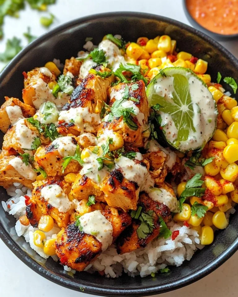 Delicious Mexican Street Corn Chicken Bowl topped with fresh ingredients