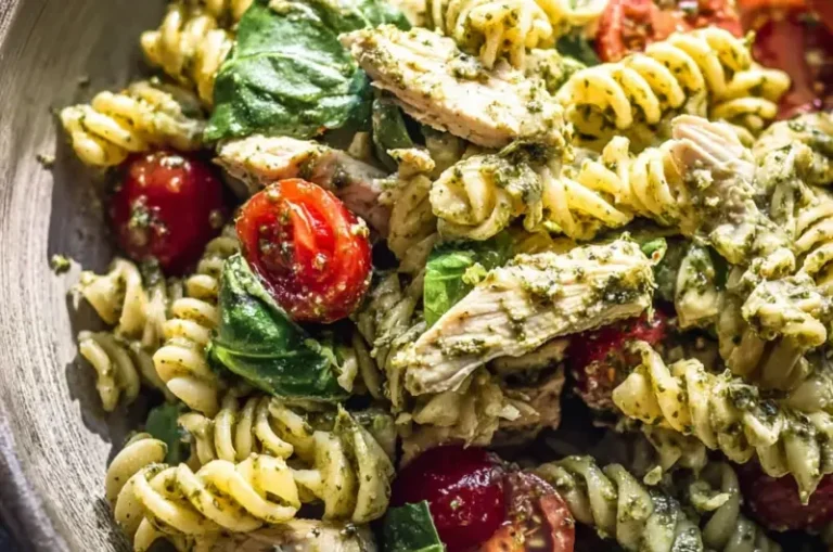 Delicious Pesto Chicken Pasta Salad with fresh ingredients and vibrant colors.