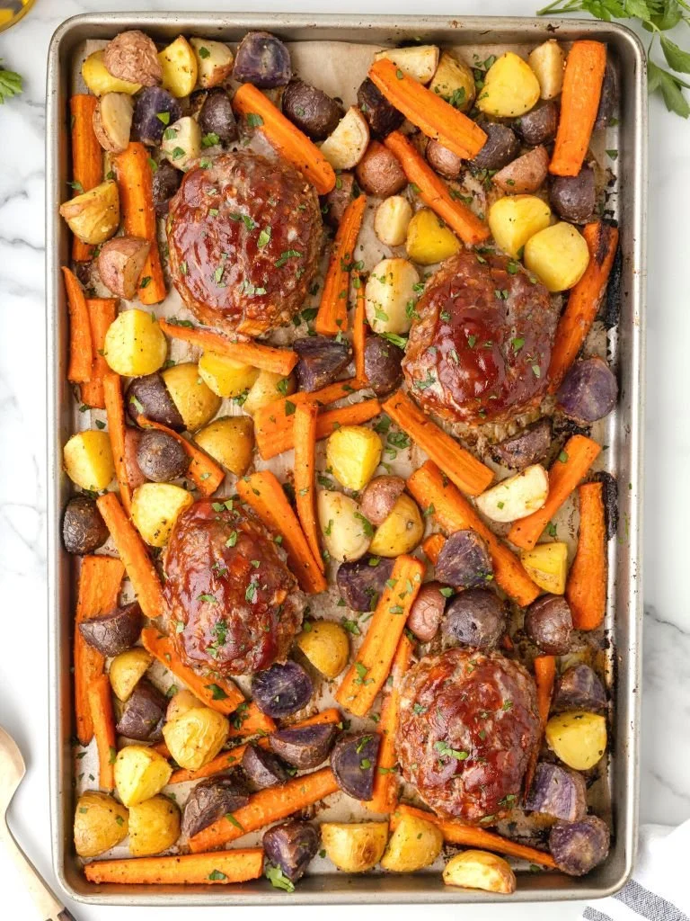 Delicious Sheet Pan Mini Meatloafs cooked to perfection on a baking sheet