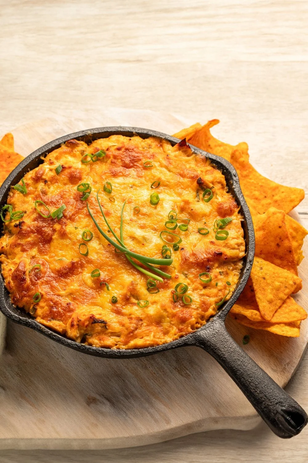 Delicious Traeger Buffalo Chicken Dip served in a bowl with tortilla chips.