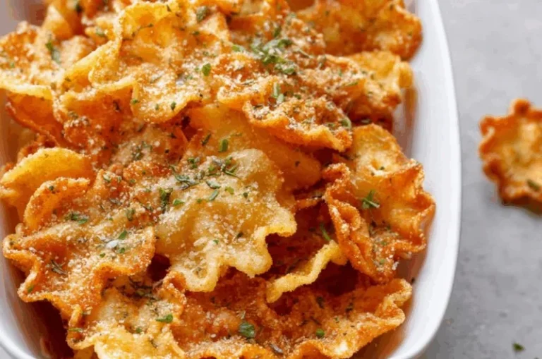 Crispy air fryer pasta chips served in a bowl with seasoning