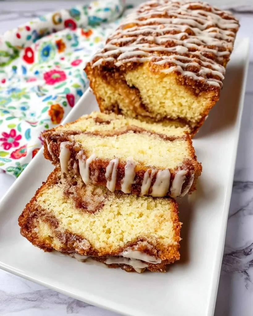 Delicious homemade Apple Fritter Bread with glaze and apple chunks