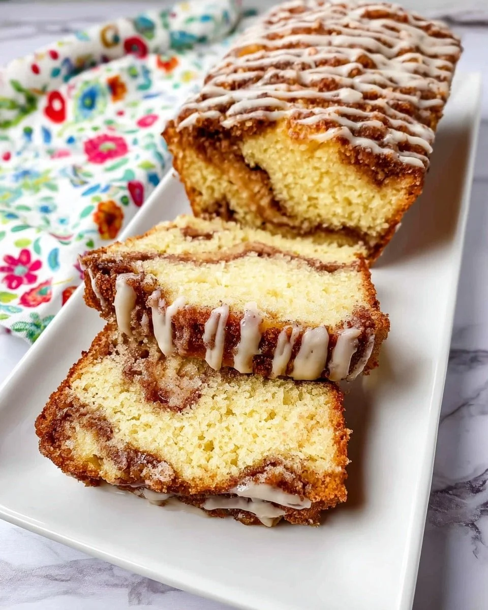 Delicious homemade Apple Fritter Bread with glaze and apple chunks