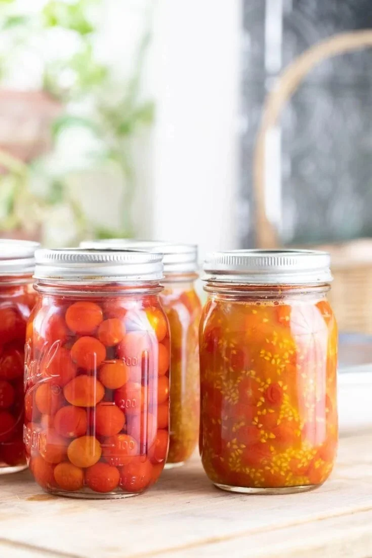 Canning cherry tomatoes in jars preserving summer flavors