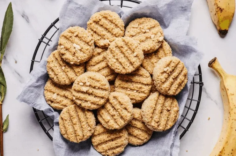 Peanut butter banana cookies on a baking tray, ready to be enjoyed.