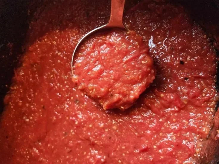 Homemade roasted tomato sauce ready for canning.