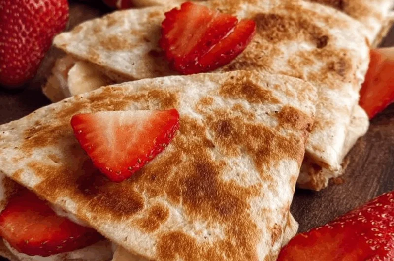 Delicious Strawberry Banana Quesadilla with fresh fruit and melted cheese